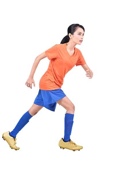 woman soccer player running (playing soccer FAQ)