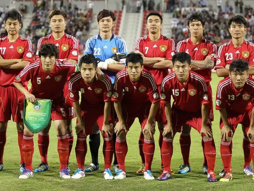 Members of the Chinese national soccer team pose for a group picture before a game.