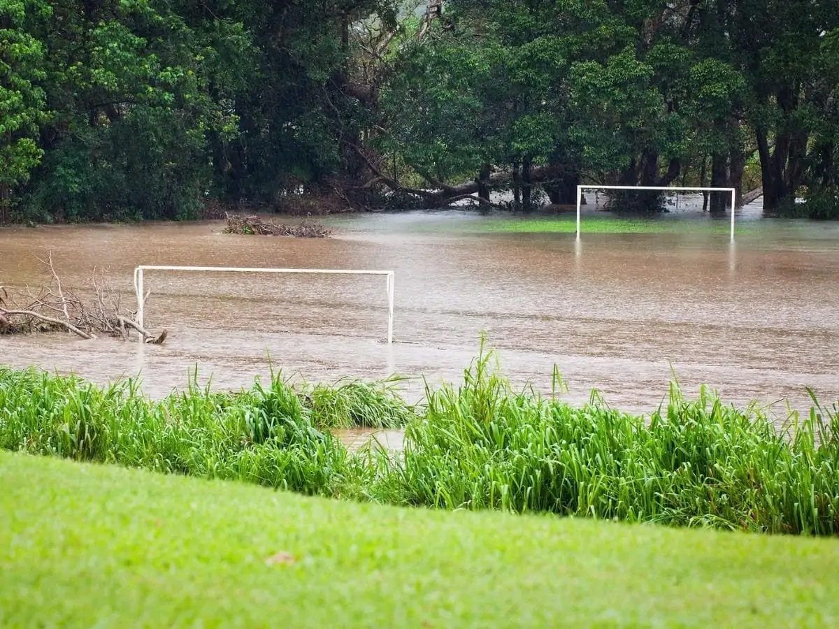 A flooded soccer field after heavy rain in Queensland Australia ○ Soccer Blade