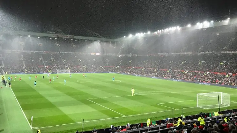 Old Trafford with heavy rain before a game