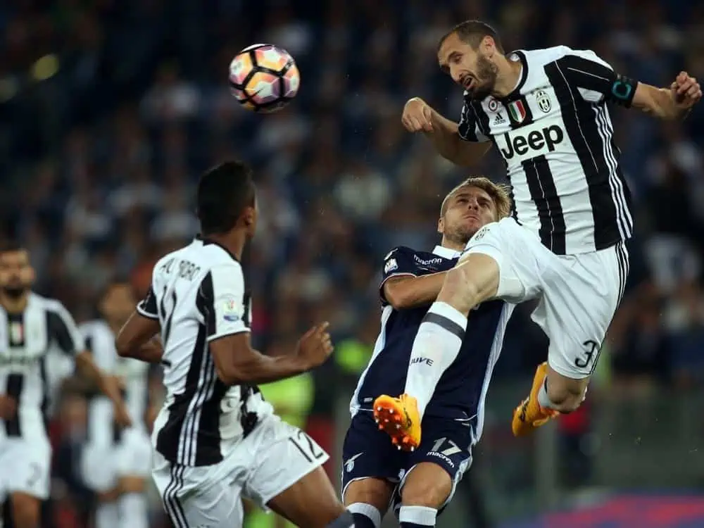 Juventus vs S.S. Lazio. Chiellini and Immobile in action during TIM CUP Final soccer match S.S. Lazio vs FC Juventus 17.05.2017. Stadio Olimpico. Tim Cup Final