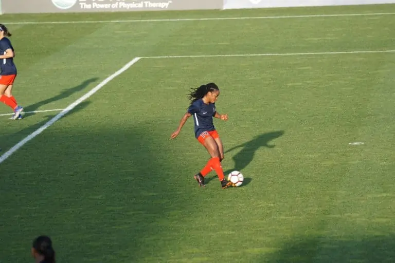 Youth female soccer player on the ball