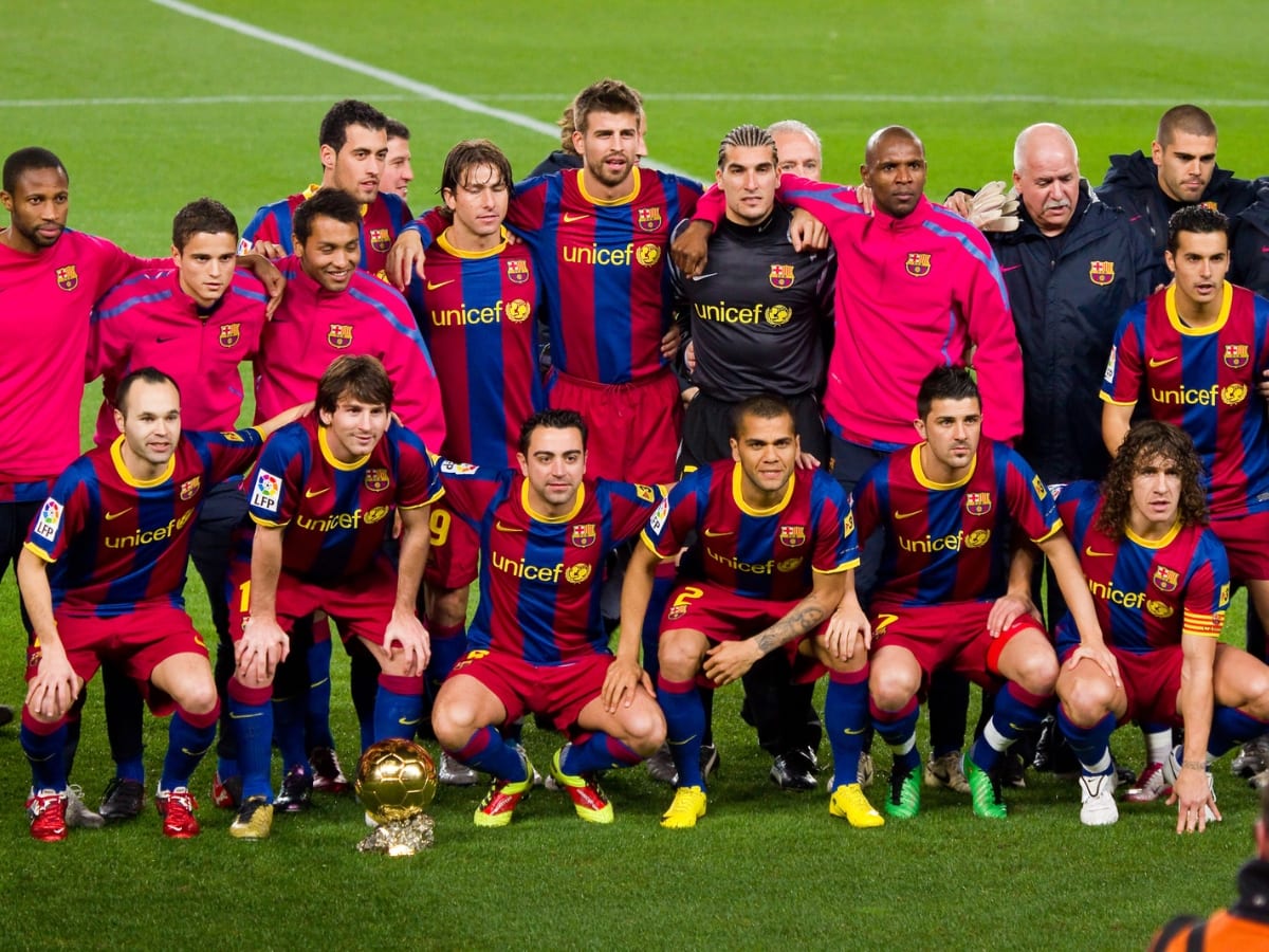 Barcelona players with the Golden Ball Trophy of Leo Messi in Camp Nou stadium on January 12 2011 in Barcelona Spain. ○ Soccer Blade