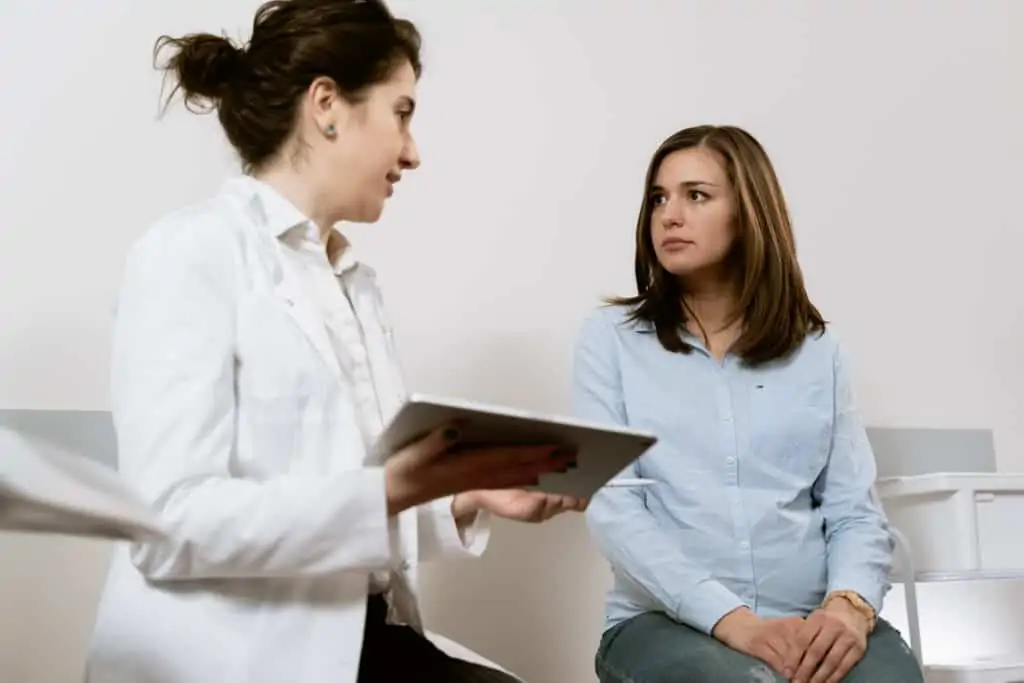 Doctor with a female patient