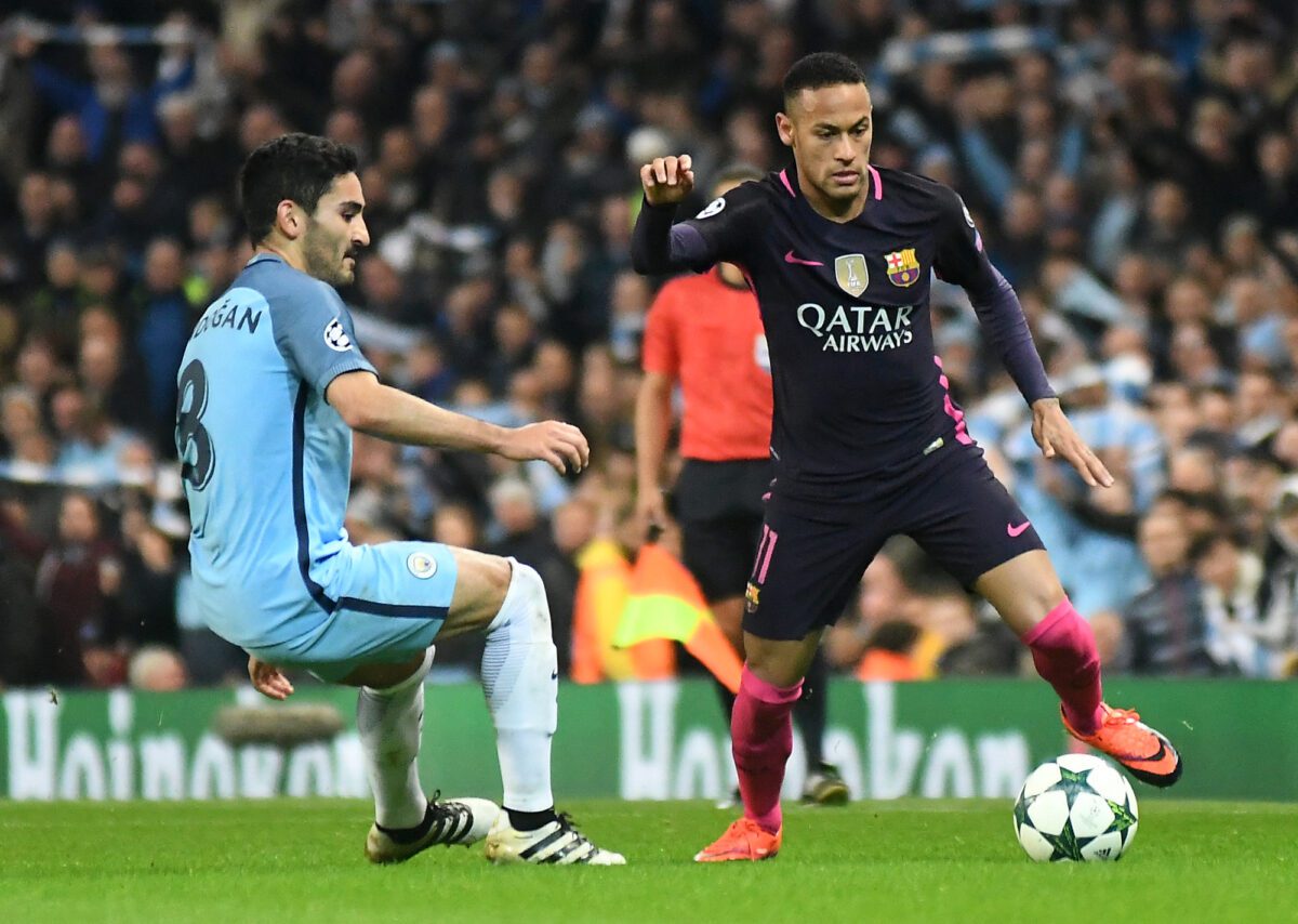 Ilkay Gundogan L of City and Neymar Jr. R of Barcelona pictured in action during the UEFA Champions League Group C game between Manchester City and FC Barcelona at City of Manchester. ○ Soccer Blade