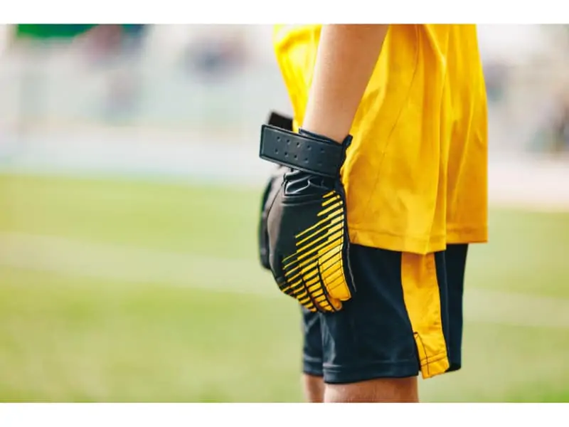 Soccer goalie standing - view of gloves