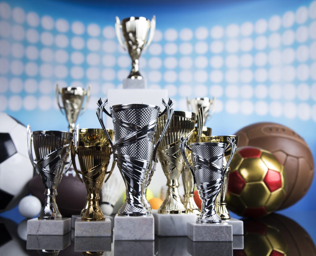 Soccer winner podium trophies balls. ○ Soccer Blade