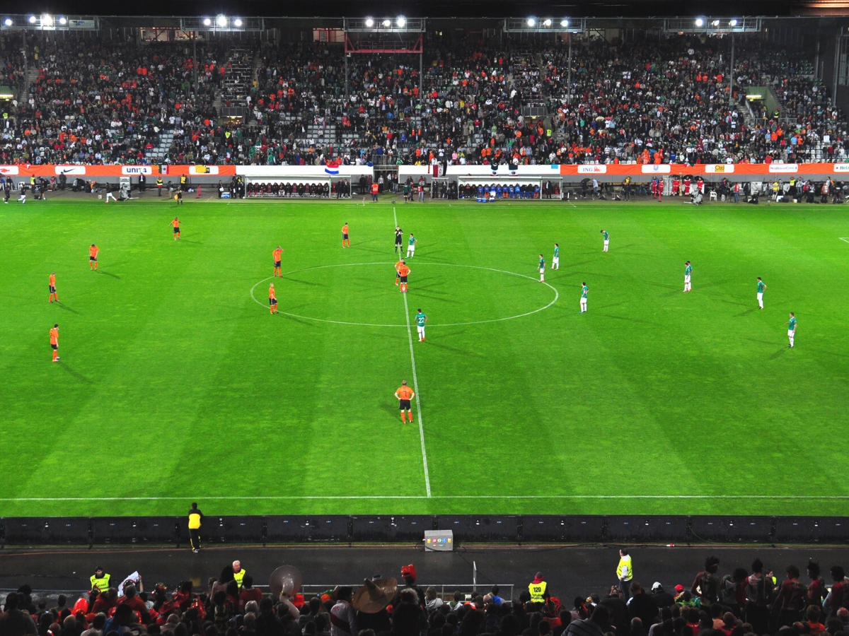 Mexico vs. Netherlands international friendly soccer game. Players in position before kick off. ○ Soccer Blade
