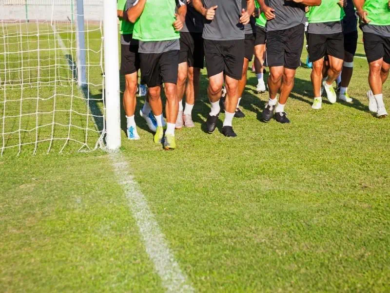 College soccer players training