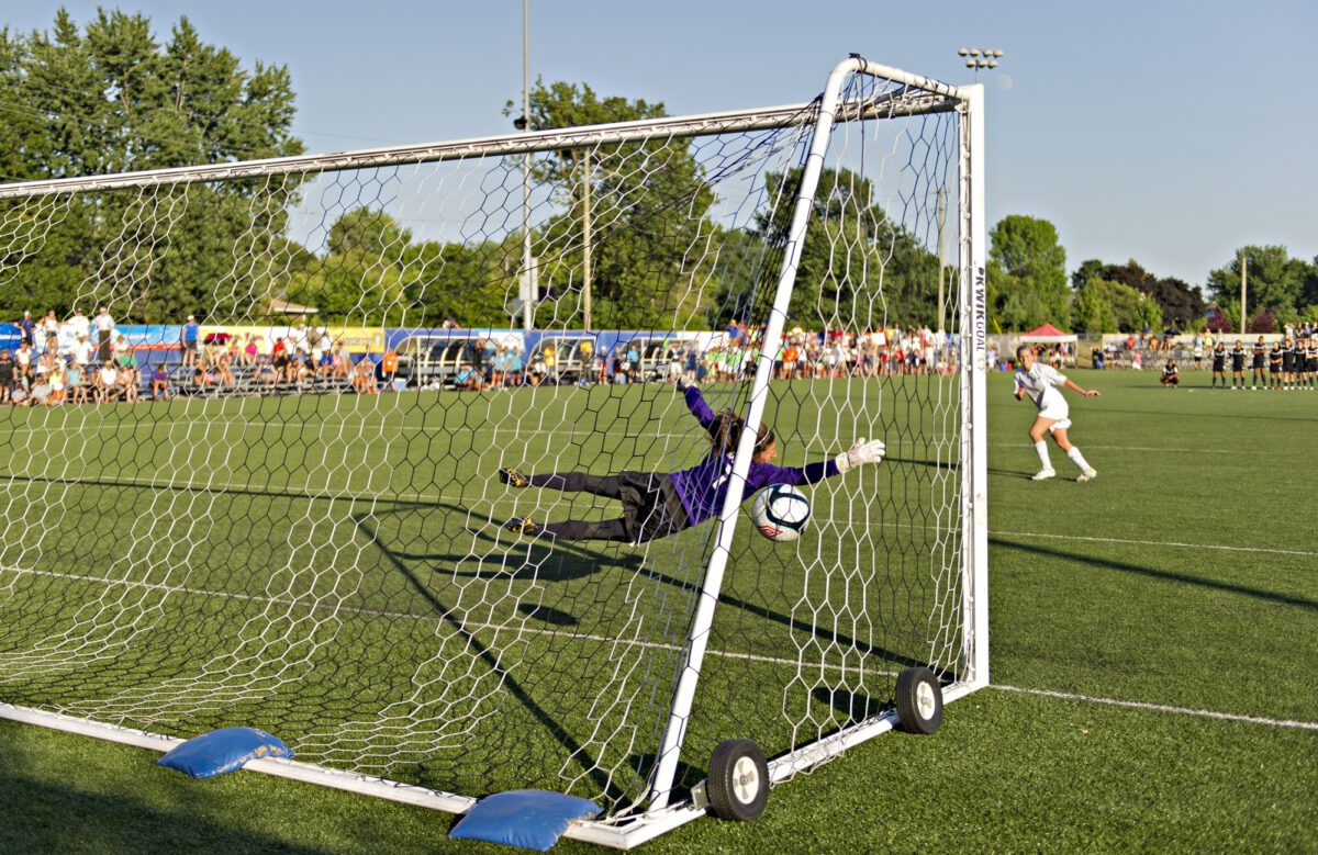 Kelly Conheeney right in white scores the winning penalty for Ottawa Fury as they win the 2012 W League Championship after defeating Pali Blues 4 3 on penalties after the game finished 1 1 ○ Soccer Blade