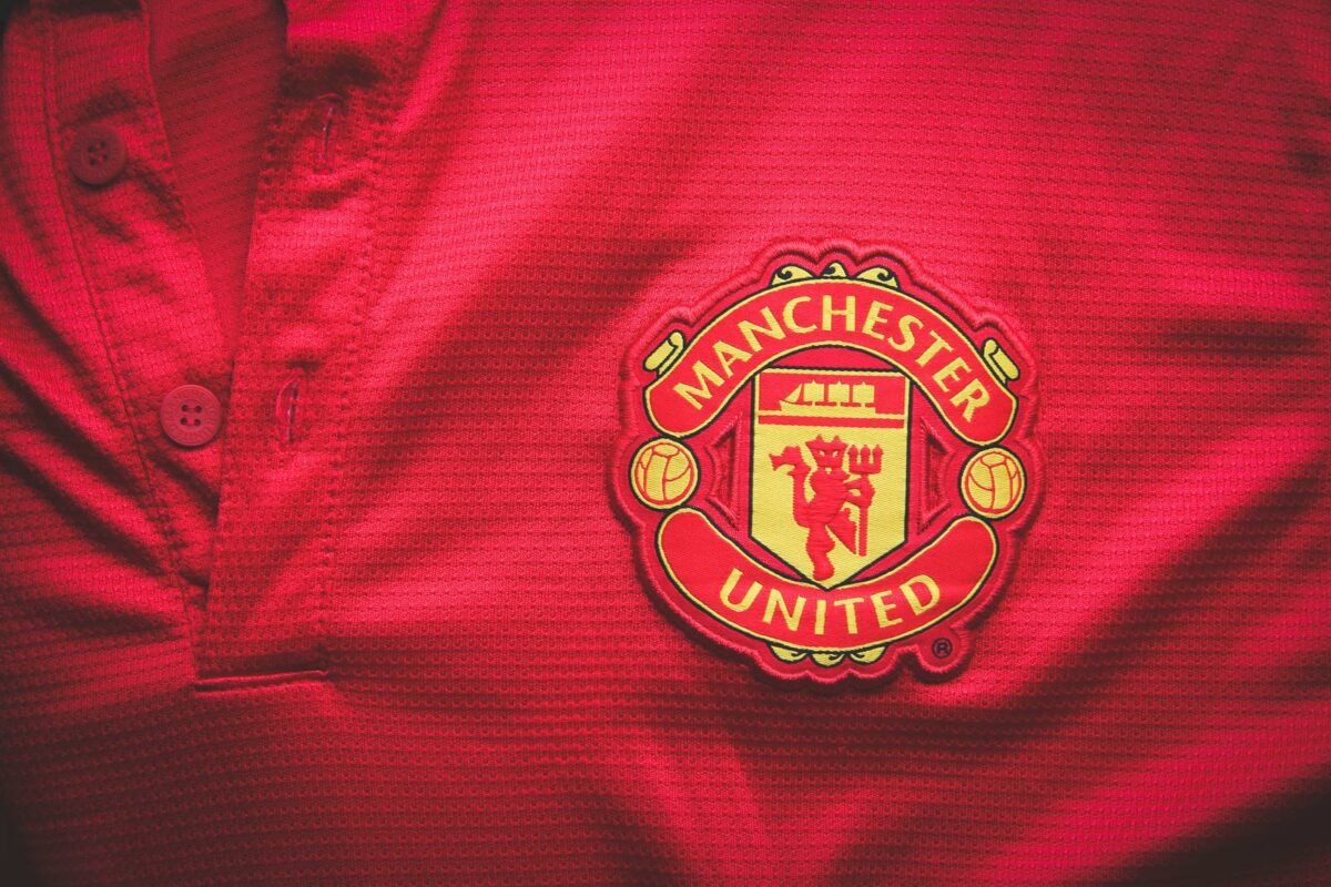 Manchester United Logo badge crest embroidered on their jersey. ○ Soccer Blade