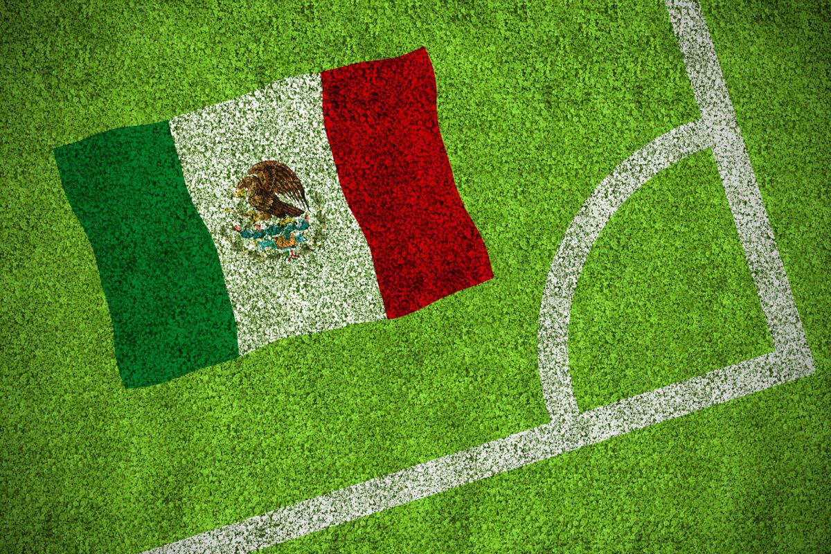 Mexico national flag against corner of soccer field. ○ Soccer Blade