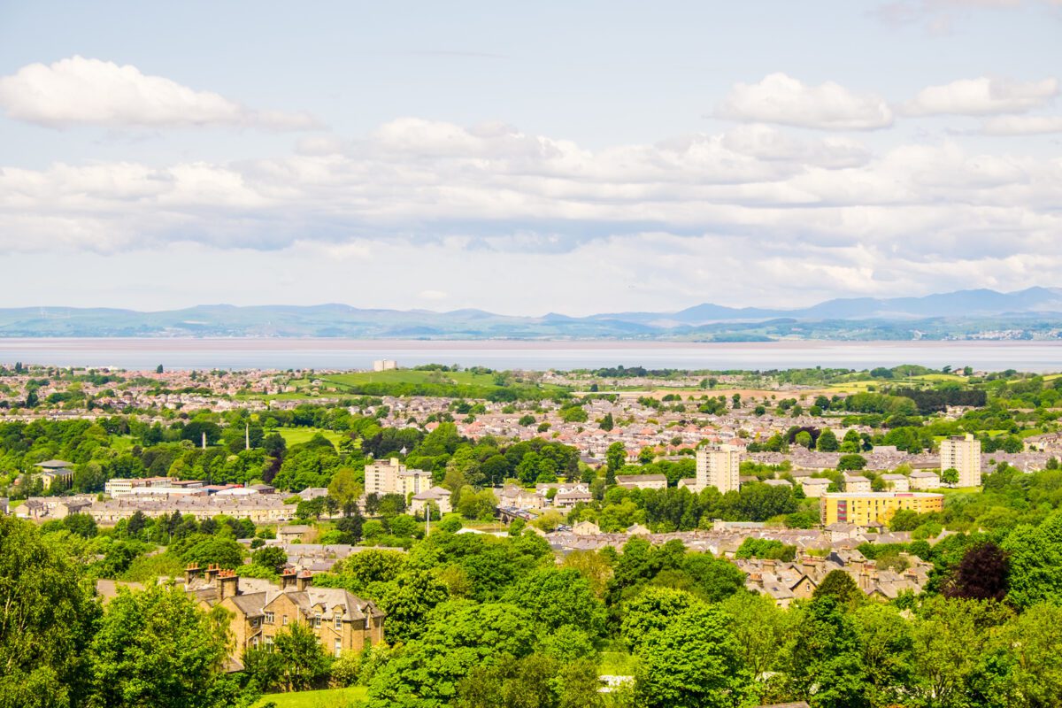 The cityscape of Lancaster with Morecambe Bay viewed from the Ashton Memorial. ○ Soccer Blade