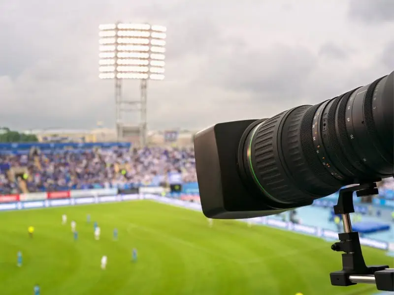 filming a soccer match