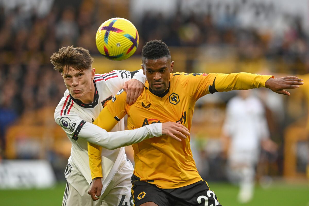 Alejandro Garnacho of Manchester United and Nlson Semedo 22 of Wolverhampton Wanderers battle for the ball during the Premier League match Wolverhampton Wanderers vs Manchester United at Molineux. ○ Soccer Blade