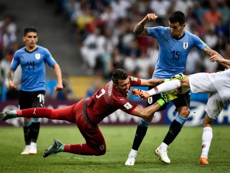 Fernando Muslera of Uruguay front saves the ball in the round of 16 game between Uruguay and Portugal during the 2018 FIFA World Cup in Sochi Russia 30 June 2018