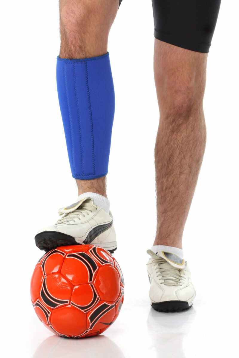 Soccer player wearing a neoprene brace over white ○ Soccer Blade
