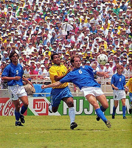 Franco Baresi no. 6 going for the ball before Romario no. 11 Brazil v Italy 1994 FIFA World Cup Final Paolo Maldini no. 5 and Roberto Mussi no. 8 observe. ○ Soccer Blade