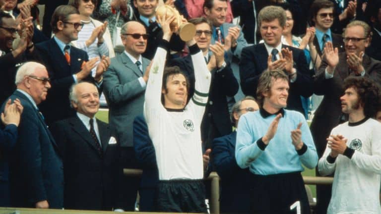 Franz Beckenbauer lifting up La Copa Del Mundo