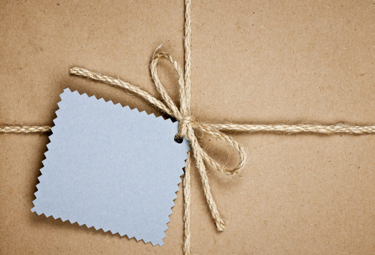 Gift with blue card in brown paper ○ Soccer Blade