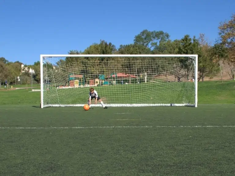 Portable Full Sized Soccer Goal Youth Player in Goal