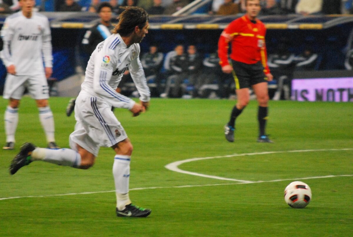 Sergio Ramos dribbling with the ball for Real Madrid. ○ Soccer Blade