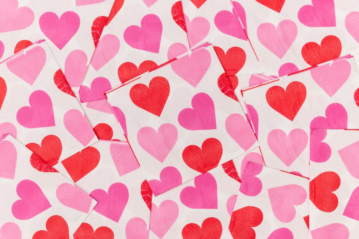Valentine Hearts napkins randomly arranged forming a hearts background ○ Soccer Blade