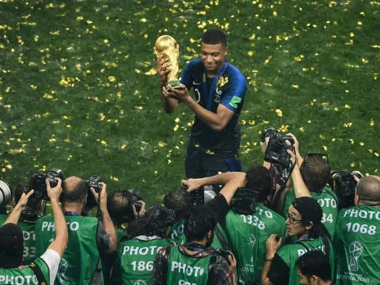 Kylian Mbappe of France with the World Cup trophy after France defeated Croatia in their final match during the 2018 FIFA World Cup in Moscow Russia 15 July 2018.