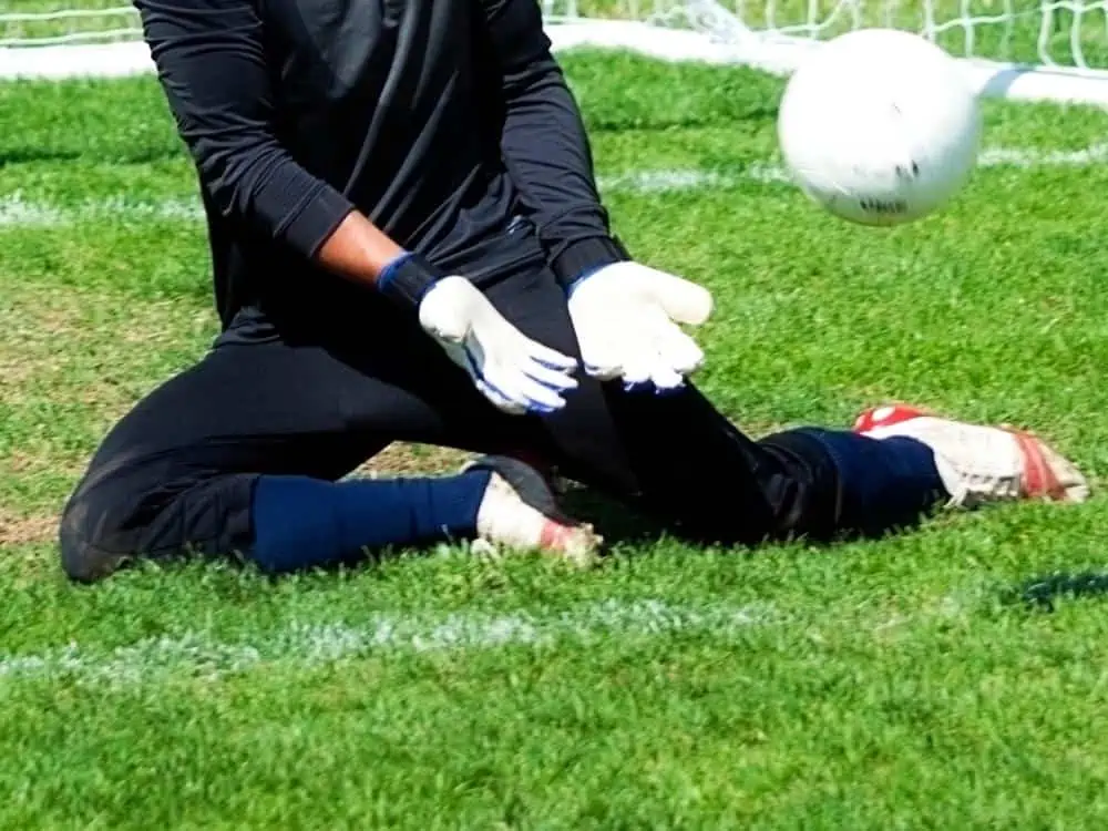 Soccer goalie with padded pants