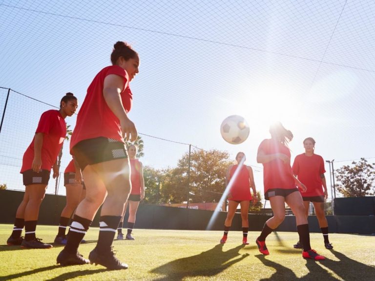 Women training with a soccer ball ○ Soccer Blade