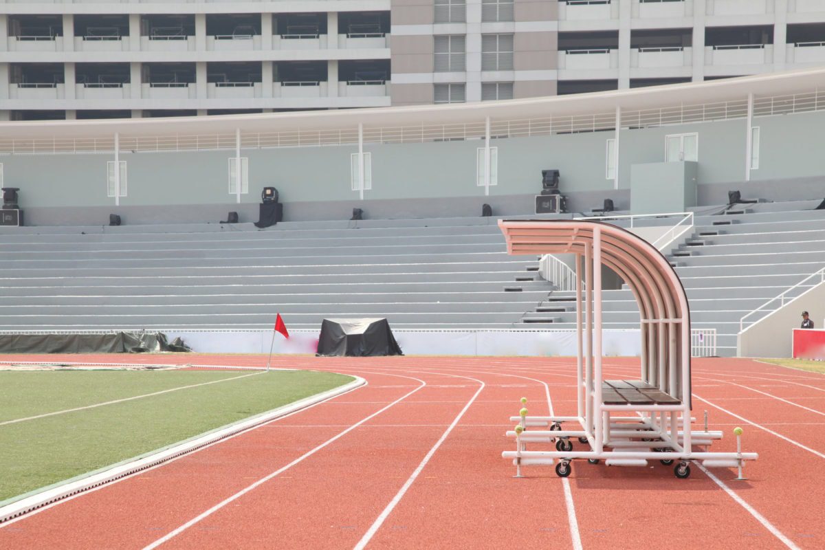 Coach and reserve benches in soccer stadium side view. ○ Soccer Blade