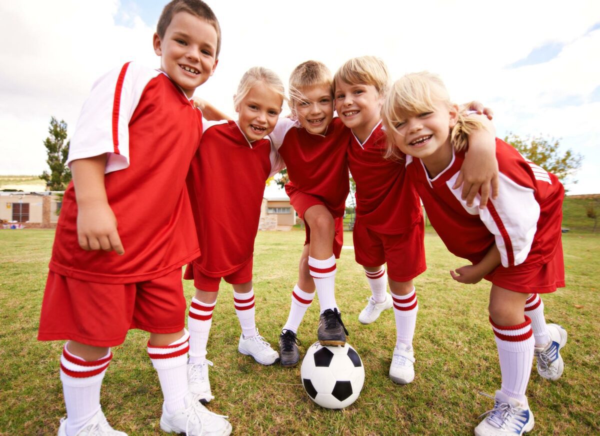 Kids just wanna have fun. Shot of a childrens soccer team ○ Soccer Blade
