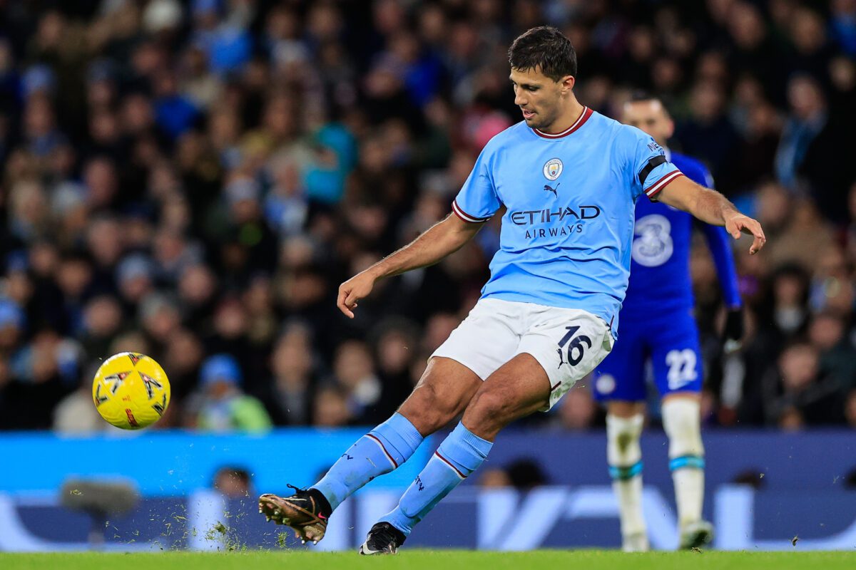 Rodri 16 of Manchester City passes the ball during the Emirates FA Cup Third Round match Manchester City vs Chelsea at Etihad Stadium Manchester United Kingdom 8th January 2023 ○ Soccer Blade