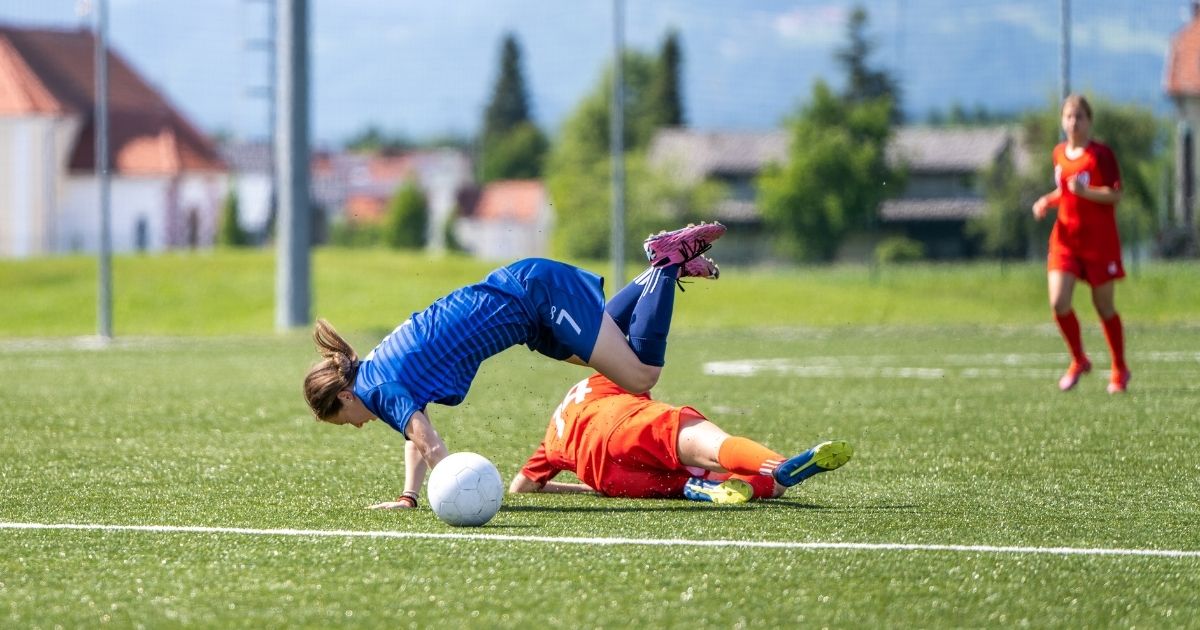 Sliding tackle on soccer pitch ○ Soccer Blade